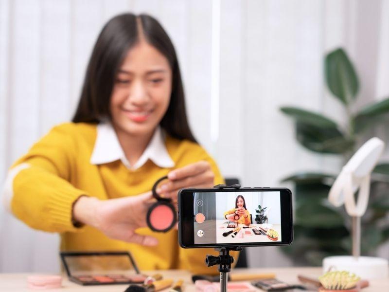 woman making a video - Why the First Few Seconds Matter